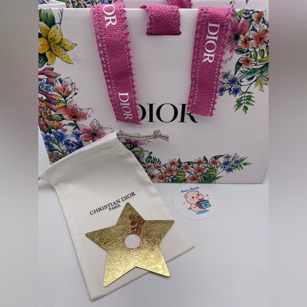 Dior gold tone Flower star charm with Gift bag & la collection dust bag